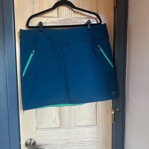 Insulated Blue Skirt with Three Pockets and a Side Zipper